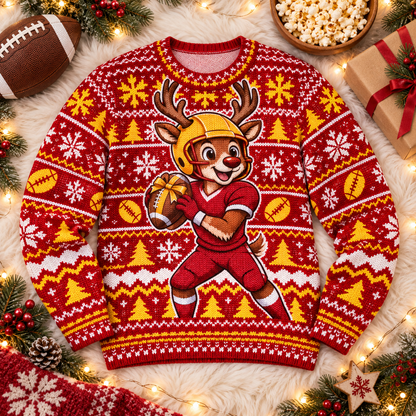 Reindeer Quarterback football ugly Christmas sweater laid flat on a white faux-fur blanket with a football and popcorn